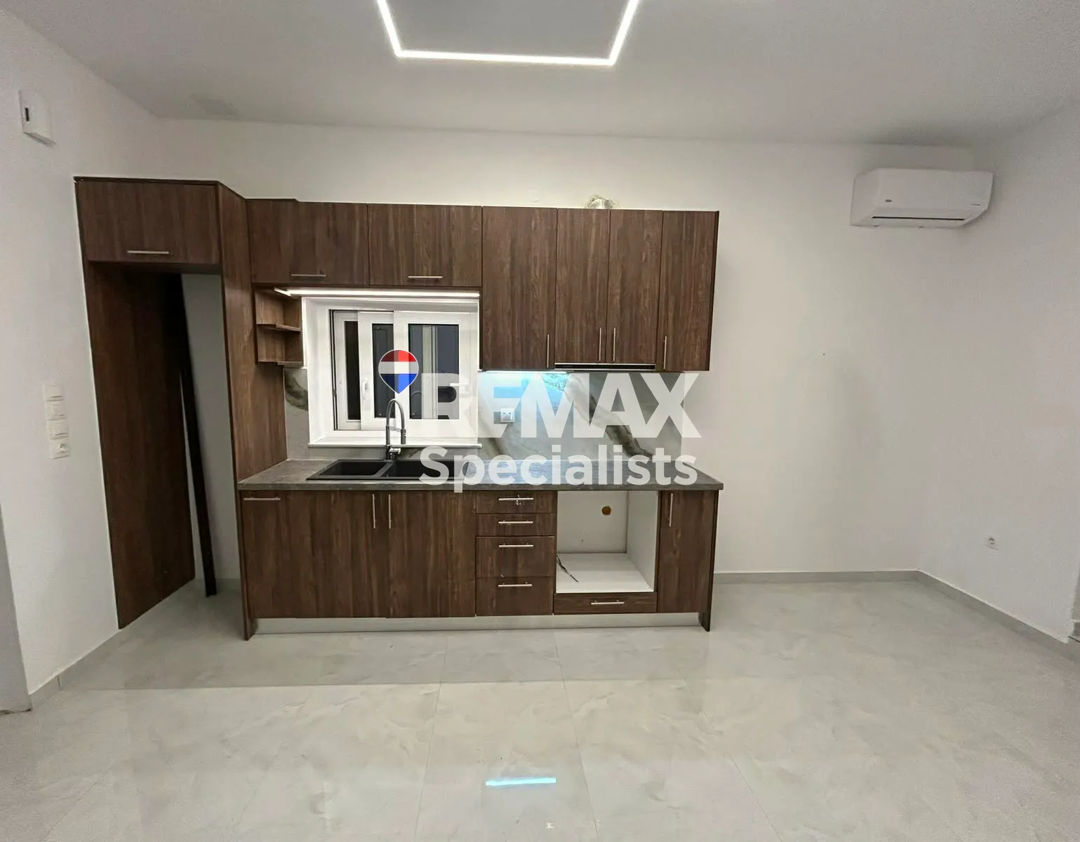 Renovated apartment in Kournas — photograph from official listing 2541325.
